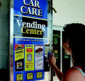 woman using a Laurel vending machine